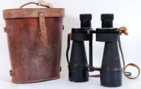 BINOCULARS: A pair of vintage Prism No.5 Mk1 binoculars. 7x50. Within the original leather case.