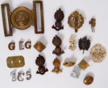 CAP BADGES: A collection of military WWII and later cap badges and buttons to include Royal