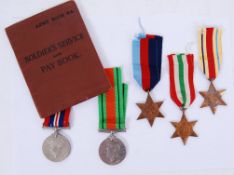 WWII MEDAL GROUP: A Second World War WWII medal group of five including the Africa and Italy Stars,