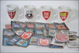 A collection of 1970's football keyrings to include Nottingham Forrest, Bristol City, Ipswich,