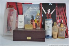 A collection of perfume bottles some with contents and some without to include Chanel boxed along