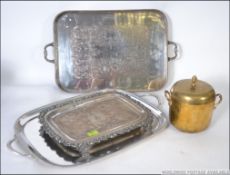 A group of three heavily silver plated serving salvers along with copper lidded ice bucket Largest