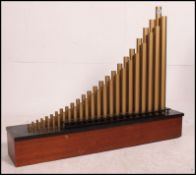 A mounted Organ speaker system by Conn.