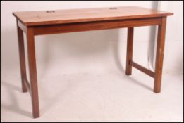 A vintage Industrial solid wood school science laboratory table bench desk with polished metal drop