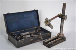 A vintage 20th century engineering cased Hirth Minimeter use for measuring bearings.
