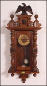 A 19th century Walnut Vienna regulator wall clock, the 7