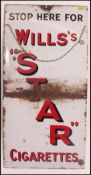 A vintage early 20th century enamel advertising sign for Wills Star Cigarettes.