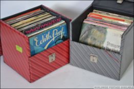 A collection of 45rpm vinyl singles dating back to the 1960's consisting of several different