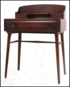 An original 1950's Lucian Ercolani for Ercol Windsor dark finish (479) elm and beech writing desk