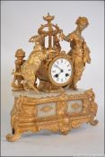 A 19th century alabaster and gilt metal French mantel clock by Vincent et Cie.
