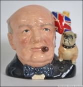 A Royal Doulton character jug modelled as Winston Churchill by Stanley James Taylor, number D6907,
