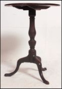 An 18th century Georgian mahogany tilt top wine table of good proportions.
