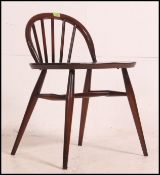 A 1950's original low Lucian Ercolani for Ercol Windsor (414) style low back desk / dressing chair