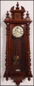 A stunning Victorian walnut large Gustav Becker Vienna regulator wall clock.