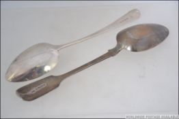 A 19th century Georgian silver hallmarked table spoons by Thomas Dicks of London, date L for 1806,