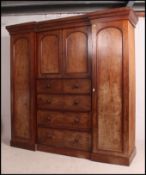 A Victorian triple wardrobe compactum.