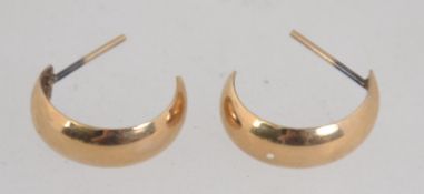 A pair of 9ct gold hoop earrings with post backs. Marked 375 to body, tests 9ct gold. Measures 1.