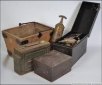 A collection of vintage tin and wooden cases some with contents to include latches etc along with a