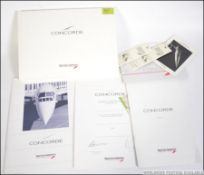 A collection of items pertaining to Concorde from a flight by Concorde on August 4th 1996,
