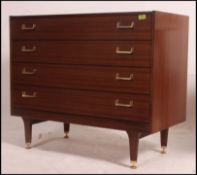 A vintage vintage g plan Ernst Gomme straight four chest of drawers from the Librenza range with a