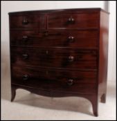 A 19th century late Georgian mahogany bow front chest of drawers.