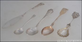 A silver 800 marked caddy spoon with shell bowl together with an 800 marked teaspoon,