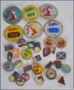 A good collection of Butlins & Pontins enamel badges to include 913 club, Beaver Club,