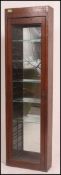 A Victorian thin oak shop hanging display cabinet - haberdashers cabinet having full length door