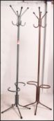 A pair of 1970's painted metal hat - coat stands, one brown,