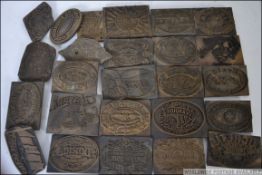 A collection of vintage advertising blocks predominately for tobacco to include blocks for Lady