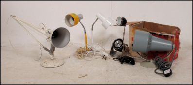 A collection of retro lights to include a early Herbert Terry with pendant shade raised on a