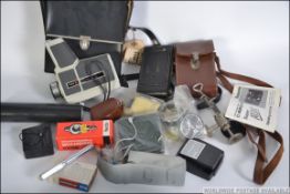 A vintage Butchers Popular Watch Pocket Carbine bellows camera together with lots of photographic