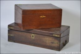 A 19th century writing slope having appointed interior ( af) together with another Victorian