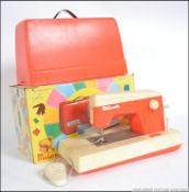 A retro 1970's French boxed childs Sewing machine - Ma Cousette. With box.
