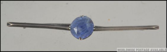 A Ladies Victorian pin bar brooch set with a believed ceylon blue sapphire. Weight 4.