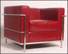 After Le Corbusier. An ' LC2 ' type red leather and chrome armchair.