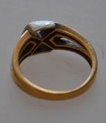 A marked 18ct diamond ring with geometric buckle mount .20 carat 4.3g RS K.