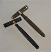 A Swan self filler Mabie Todd and Co fountain pen along with a Parker Duofold fountain pen both