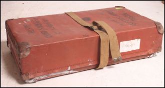 A vintage mid century Fishponds, Bristol laundry box with strap having notation to top.