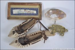 A mixed lot to include a mother of pearl and silver plated pin dish together with a brass pin dish