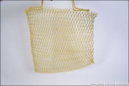 5 vintage 1970's yellow mesh - metal ladies handbags,