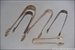 4 pairs of silver hallmarked sugar tongs to include Harrison & Hipwood -possibly, London 1879,