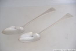 2 19th century Georgian silver hallmarked table spoons by John Lias of London,