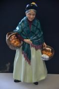 A 1940's Royal Doulton figure bone china figurine ' The Orange Lady ' HN 1953,