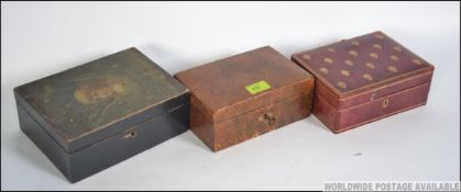 A Victorian leather jewellery box complete with key together with a red leather and gilt tooled