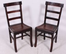 A pair of 19th century Chinese hardwood dining chairs having squared legs with peripheral