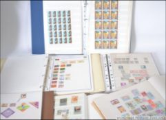 An album of stamps most appearing to be Algerian / related in origin,