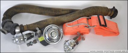A vintage deep sea divers Comex mouth piece breathing apparatus along with air tank valve,