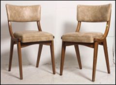 A pair of 1950's retro Bentwood bridge chairs / armchairs Ben-Chairs.