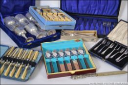 Mixed lot of plated flatware and stainless steel pieces ,